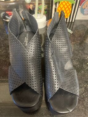 8100 Melrose Italian leather Black Perforated Peep-Toe Wedge Booties